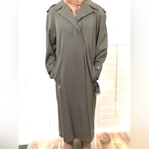 This is a 100 percent wool vintage, military, army green long trench coat.